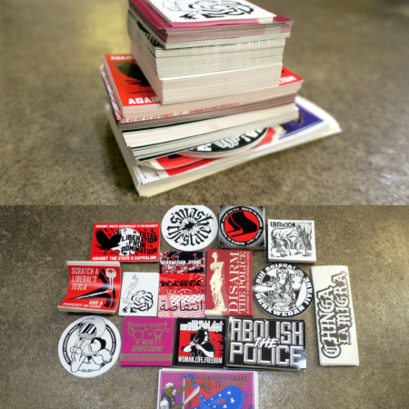 Two pictures stacked on top of one another that show what one might get in a large distro pack: the top pic shows how tall a stack of stickers you would get, the lower pic shows 15 varieties of stickers, in their smaller stacks. These stickers range from Abolish the Police to Youth Lasagna Front.